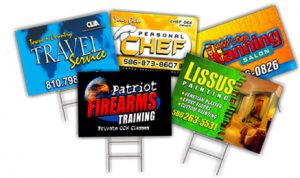 picture of yard signs with creative messages and graphics