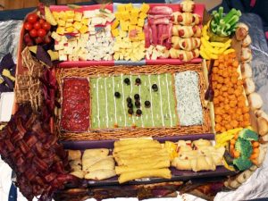 food organized to look like a football field